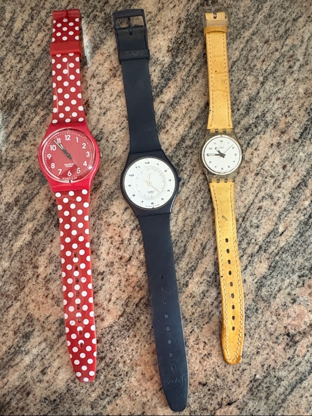 Swatch watches a set of 3 plus a free one that needs a band.. all needs battery.